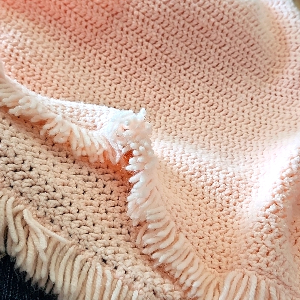 Baby crocheted afghan. Pinkish, Coral fringed edges.